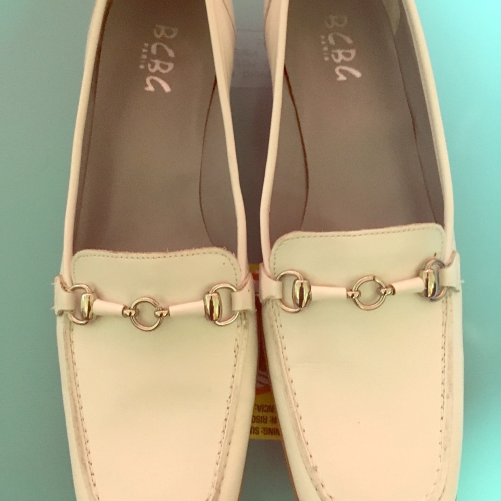 Super unique BCBG White leather loafer.